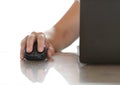 Female hand holding computer wireless mouse Royalty Free Stock Photo