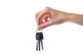 Female hand holding door key