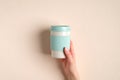 Female hand holding eco friendly reusable takeout coffee cup made from organic bamboo fiber. Zero waste, plastic free, sustainable Royalty Free Stock Photo