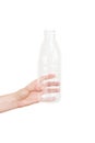 Female hand holding empty plastic bottle isolated on white. Recyclable waste. Recycling, reuse, garbage disposal Royalty Free Stock Photo