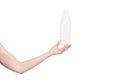 Female hand holding empty plastic bottle isolated on white. Recyclable waste. Recycling, reuse, garbage disposal, resources, envir Royalty Free Stock Photo