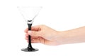 Female hand holding empty wine glass. Isolated on white background Royalty Free Stock Photo