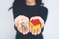 Female hand holding house key, real estate agent Royalty Free Stock Photo