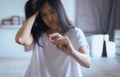 Female hand holding a medicine,Woman hands with pills on spilling pills but do not take a medicine ,emotional face expression