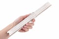 Female hand holding old slide rule Royalty Free Stock Photo