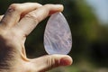 Female hand holding processed gemstone Royalty Free Stock Photo