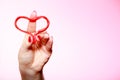 Female hand holding red heart love symbol. Valentines day. Royalty Free Stock Photo
