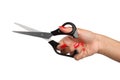 Female hand holding a scissor