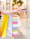 Female hand holding shopping bags Royalty Free Stock Photo