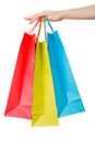 Female hand holding shopping paper bags Royalty Free Stock Photo