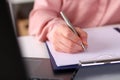 Female hand holding silver pen closeup Royalty Free Stock Photo