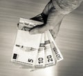 Female hand holding stacks of Euro Bills Royalty Free Stock Photo