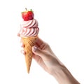 Female hand holding strawberry ice cream cone, isolated on white background with empty space AI-Generated Royalty Free Stock Photo