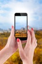 Female Hand holding and Touching a Smartphone