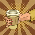 Female hand holds hot cardboard cup with coffee comic style.