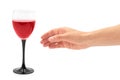 Female hand holds red Wine in glass. Isolated on white background Royalty Free Stock Photo