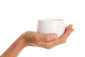 Female hand with jar of body lotion Royalty Free Stock Photo