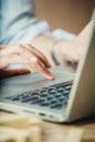 Female hand on laptop keyboard close-up Royalty Free Stock Photo