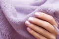 Female hand with light purple nail design Royalty Free Stock Photo