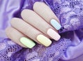 Female hand manicure colored lace elegance serenity beauty silk fabric