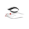 Female hand with manicure hold eyelashes. Fashion salon logotype