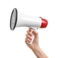 Female hand with megaphone on white background