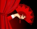 Female hand with open vintage red fan on white Royalty Free Stock Photo