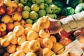 Female hand picks the oranges at the store Royalty Free Stock Photo