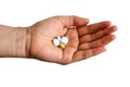 Female hand with pills isolated on white background Royalty Free Stock Photo