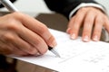 Female hand pointing on accounting document. Royalty Free Stock Photo