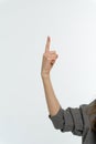 Female hand pointing up with finger number one Royalty Free Stock Photo