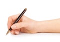 Female hand is ready for drawing with black pen. Royalty Free Stock Photo