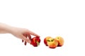Female hand with ripe nectarine isolated on a white background