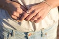 Female hand with silver jewelery, rings and bracelets minimalist Royalty Free Stock Photo