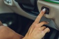 Female hand with start key inside car. Royalty Free Stock Photo