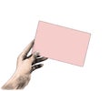 The female hand sticks out from the side and holds the rectangular card blank