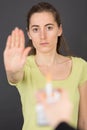 Female hand stop sign on grey background Royalty Free Stock Photo