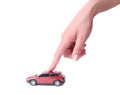 Female hand and the toy car Royalty Free Stock Photo