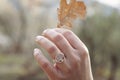 Female hand wearing beautiful silver ring Royalty Free Stock Photo