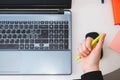 Female hand holding pen for anxiety or boredom in office Royalty Free Stock Photo