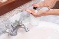 Female hands applying liquid soap, close up. Royalty Free Stock Photo