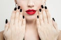 Female Hands with Black Nails Manicure and Red Makeup Royalty Free Stock Photo