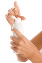 Female hands with body lotion Royalty Free Stock Photo