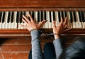 Female hands in chains on a piano Royalty Free Stock Photo