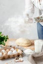 Female Hands Clapping Making Flour Splash above the Dough Royalty Free Stock Photo