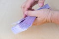 female hands close-up counting paper 500 euro banknotes, concept cash, payments, savings, banking, return money debt, car, win in Royalty Free Stock Photo