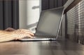 Female hands closeup typing text on laptop keyboard. Woman using computer for work, information search, communication Royalty Free Stock Photo