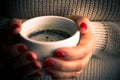 Female hands with coffee drink