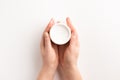 Female hands with container of cream isolated, on white background Royalty Free Stock Photo