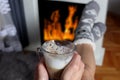 Embracing Winter Comfort: A Cozy Cup of Espresso by the Fireplace